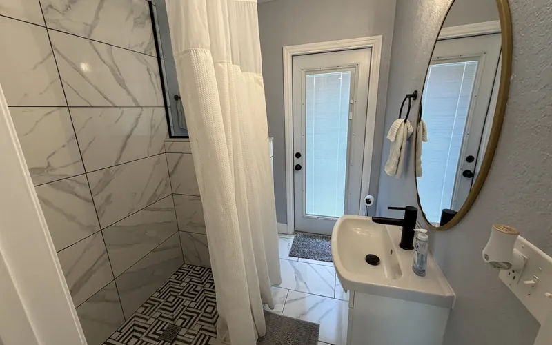 Spotless bathroom with walk-in shower after an Airbnb turnover