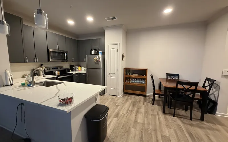 Spotless kitchen counters and island after a Tidy Standard deep cleaning