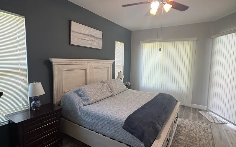 Freshly made bed and reset bedroom after a Tidy Standard cleaning